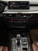 BMW X5 50i Exclusive 4.4L (7 Seater) BMW X5 XDRIVE 50i | 4.4L TWIN TURBO V8 – 450 BHP | 2014 | GCC SPECS