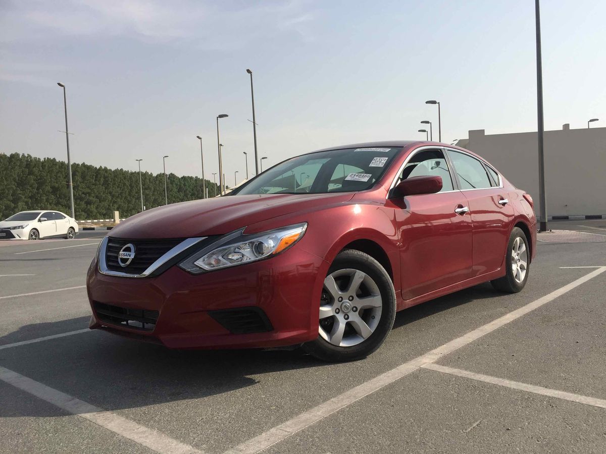 Nissan Altima for sale AED 41,500. Burgundy, 2016