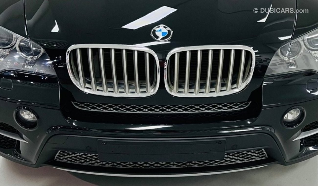 BMW X5 xDrive 50i Low Mileage .. GCC .. Original Paint .. Perfect Condition .. V8 .. DVD .