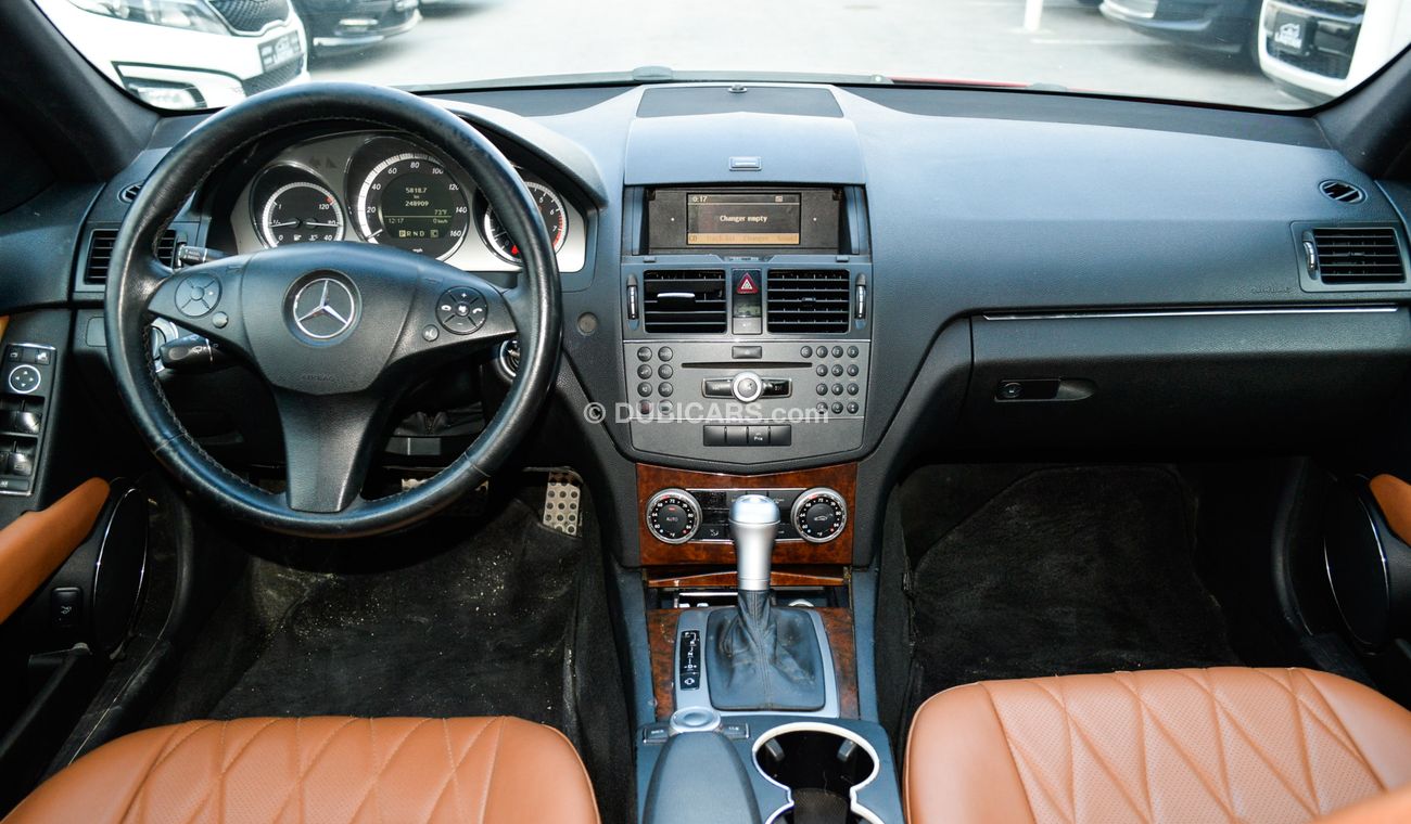 Mercedes Benz C300 C300 2009 model red color imported number one panorama leather and cruise control