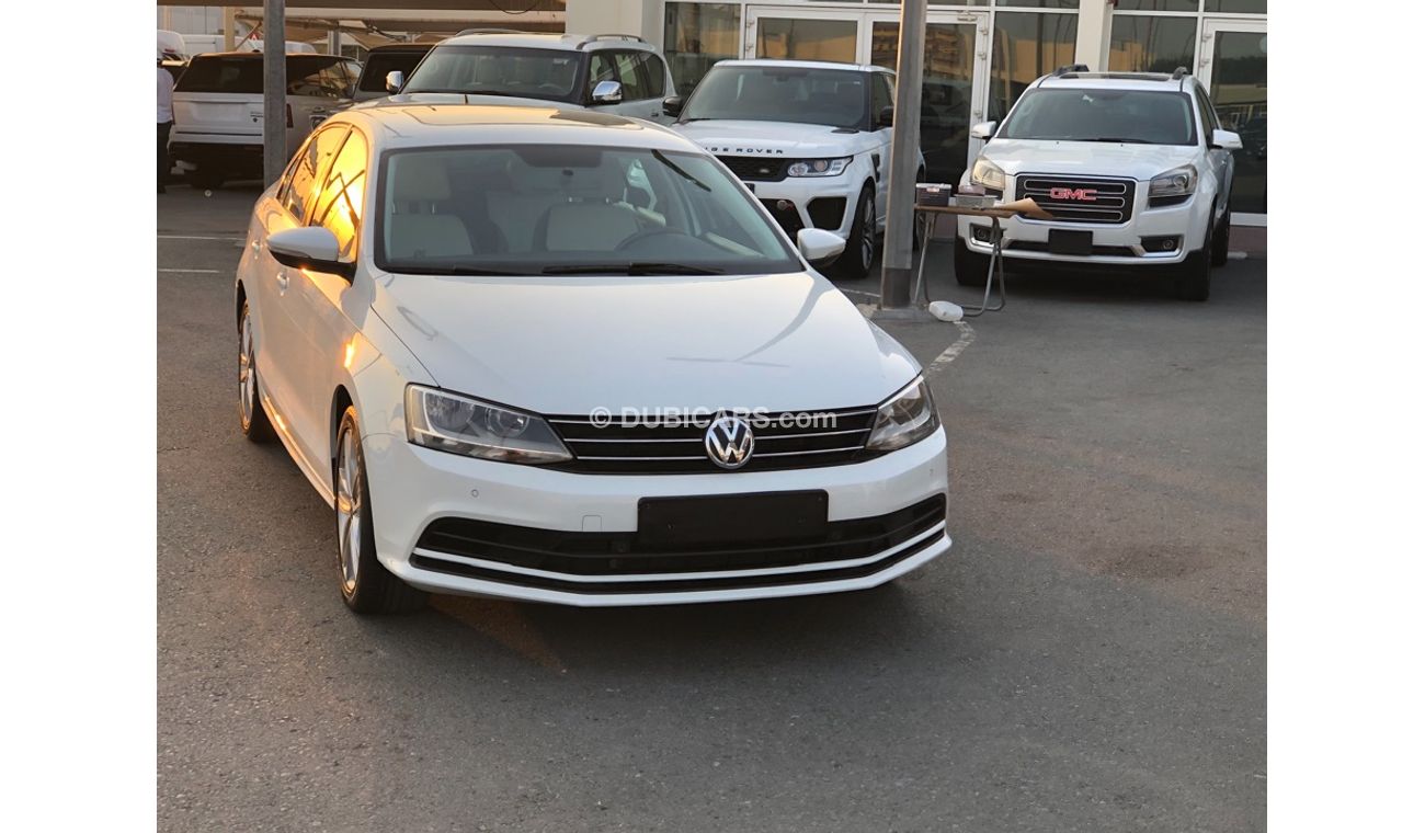 Volkswagen Jetta Volex wagan Getta model 2016 GCC car prefect condition full option sun roof leather seats back came