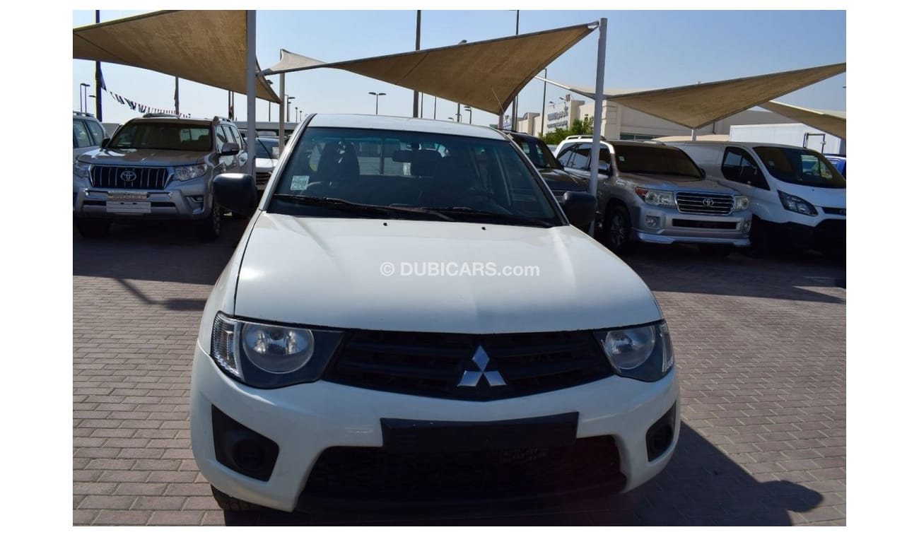 Mitsubishi L200 Std Mitsubishi L200 D/c Pick up 4x2 Diesel, Model:2012. Excellent condition