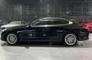 بي أم دبليو 520i 2.0 L | GCC | Low Mileage | RWD