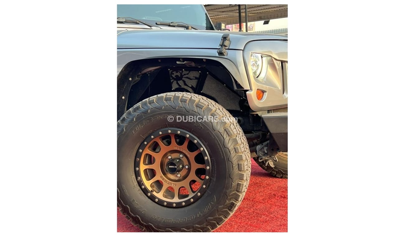 جيب رانجلر جيب رانجلر سبورت موديل : 2013 الممشي : 135,000 كم السعر : 49.000 درهم  قير عادي V6/3.6L  مواصفات خلي