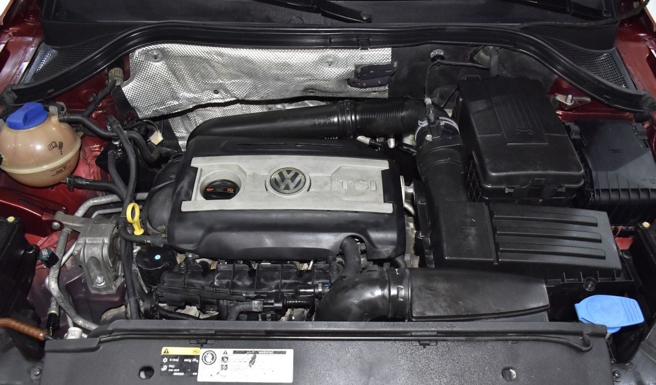 Volkswagen Tiguan SEL EXCELLENT DEAL for our Volkswagen Tiguan 2.0 TSi 4Motion ( 2014 Model ) in Red Color GCC Specs