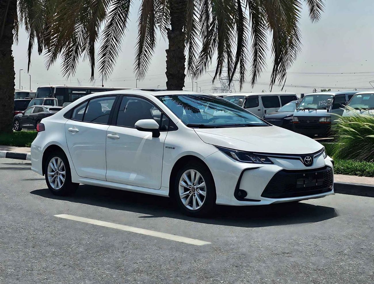 تويوتا كورولا ELITE / HYBRID / 1.8L / PUSH START, SUNROOF, DVD + CAMERA (CODE #67994)