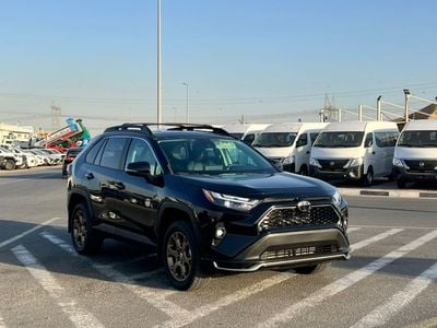 تويوتا راف ٤ 2023 Toyota RAV4 Hybrid Wood Land Edition 2.5L V4 - AWD 4x4 - Rear Camera - Leather Seats