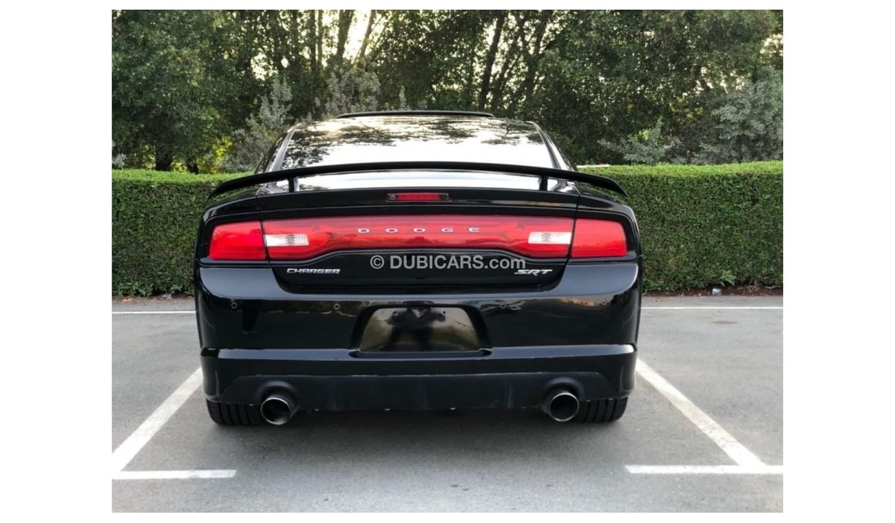 دودج تشارجر SRT8 موديل 2014 خليجي حاله ممتازه من الداخل والخارج فل مواصفات كراسي جلد ومثبت سرعه وتحكم كهربي كامل