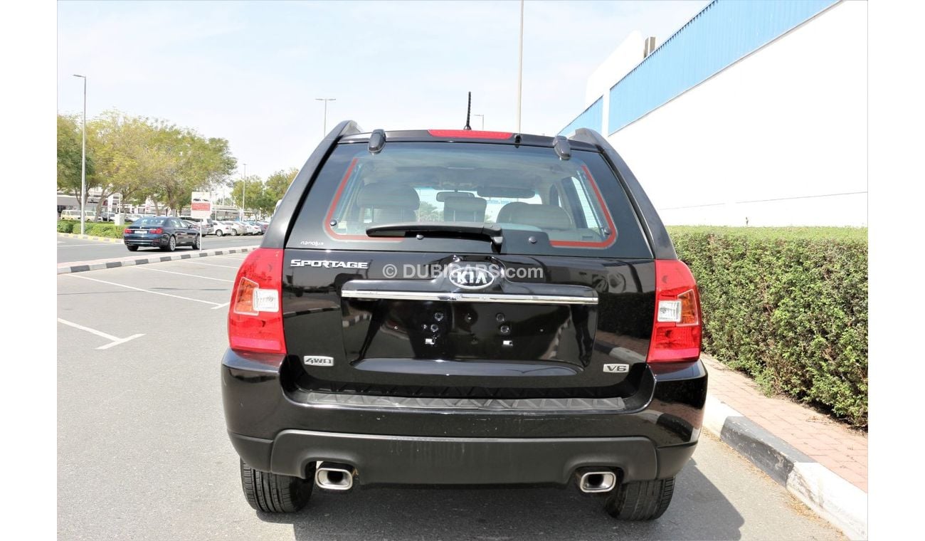 كيا سبورتيج كيا سبورتاج 2009 خليجي فل اوبشن جلد و فتحه فورويل 2700 سي سي