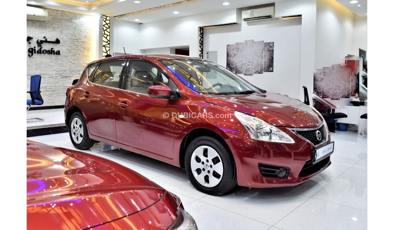 Nissan Tiida EXCELLENT DEAL for our Nissan Tiida ( 2014 Model ) in Red Color GCC Specs