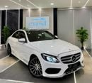 Mercedes-Benz C 200 AMG MERCEDES C200 || GCC || TOP OPTIONS || RED INTERIOR || FREE ACCIDENTS || PANORAMIC