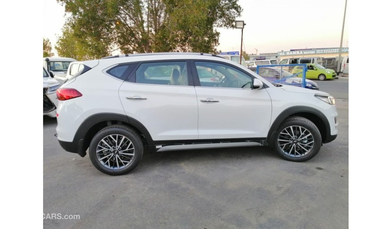 Hyundai Tucson 2.0 WITH BUSH START AND 2 ELECTRIC SEAT 2.0 مع بصمه واثنين كرسي كهرباء