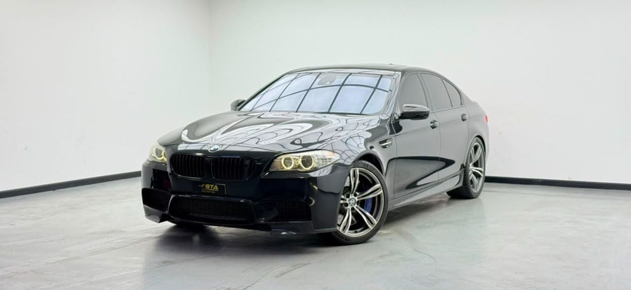 BMW M5 INDIVIDUAL 2013 BMW M5, Stage 2 Tuned, Carbon Fiber Exterior, Fully Loaded, Excellent Condition, GCC