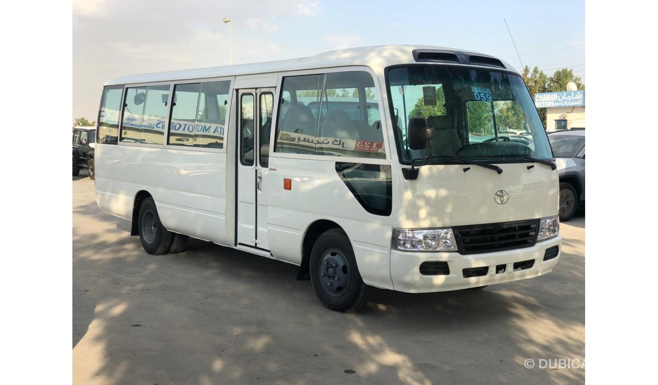 Toyota Coaster 4.2L DIESEL, Interior e Exterior Limpo, Especialmente para Angola, Grande Estoque Disponível.