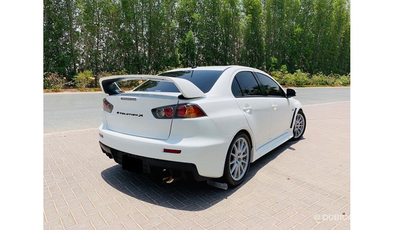 Mitsubishi Evo 2015 Mitsubishi Lancer Evolution X White | A 1001