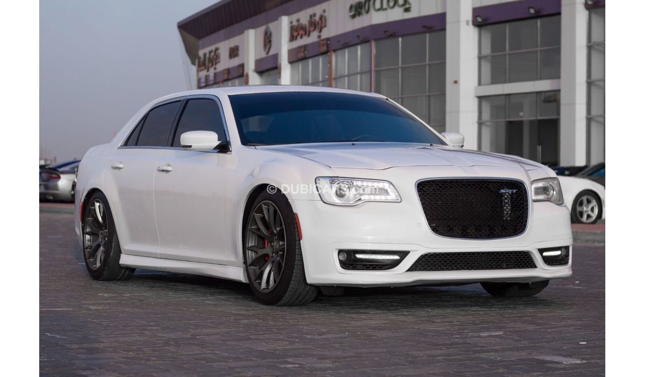 Chrysler 300C SRT8 Chrysler 300 SRT Model : 2015 Mileage : 197,000 km Price : 65,000 dirhams Gulf specifications ,