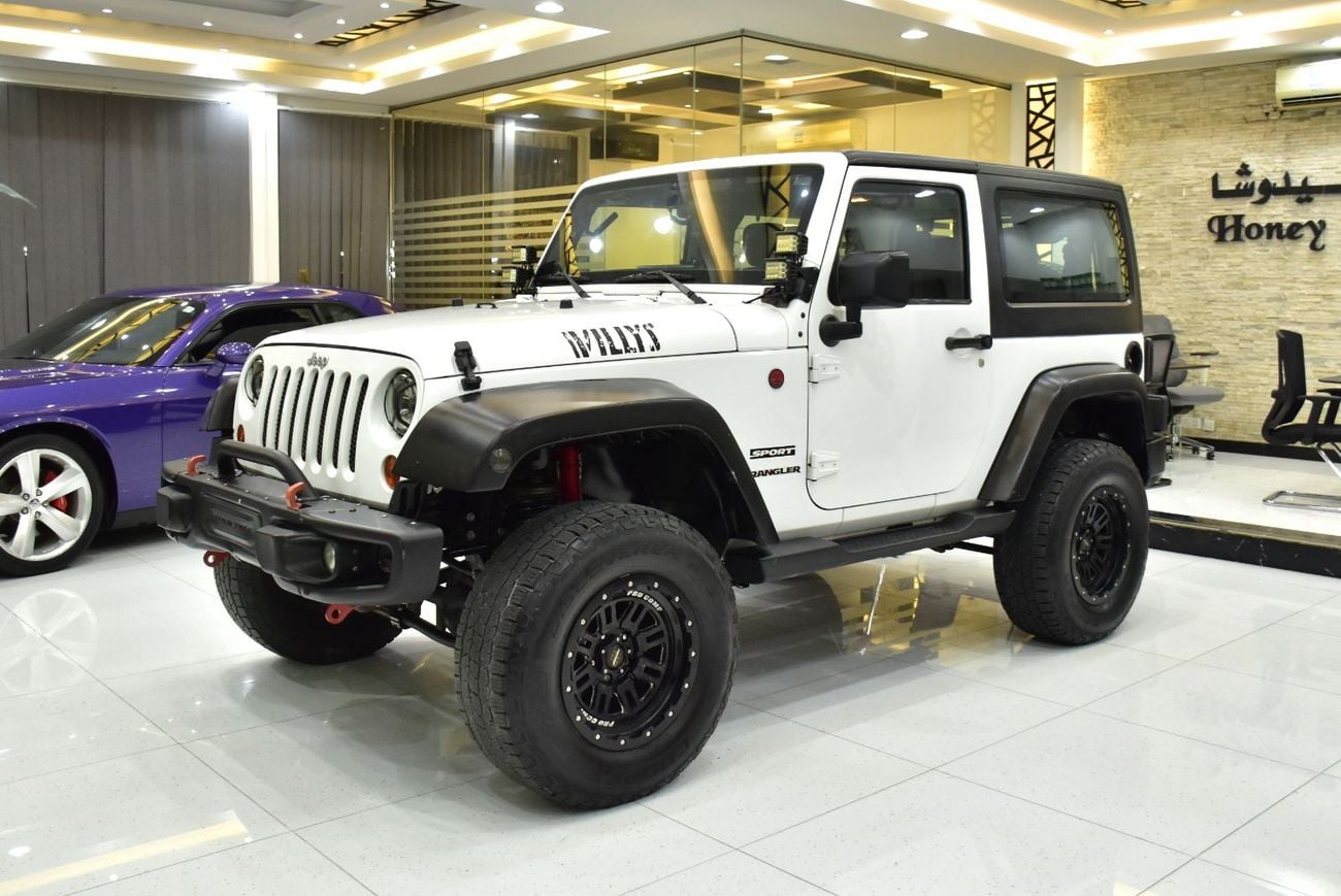 Jeep Wrangler EXCELLENT DEAL for our Jeep Wrangler Sport ( 2012 Model ) in White Color GCC Specs