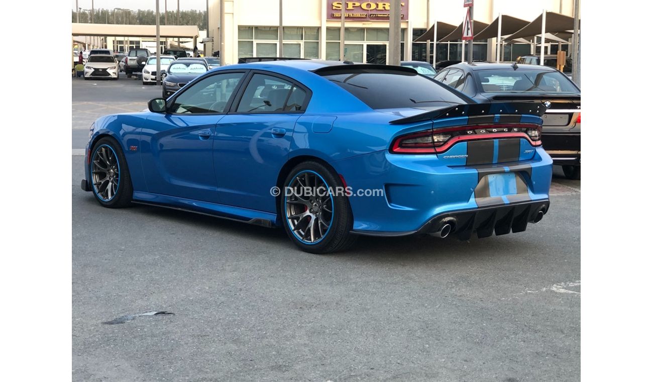 دودج تشارجر موديل 2015 خليجي فل مواصفات كراسي جلد ومثبت سرعه وتحكم كهربي كامل ونظام صوت ممتاز وكاميرا خلفيه