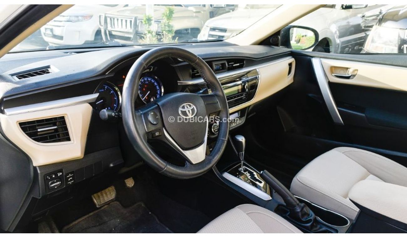 تويوتا كورولا خليجى 2015 رقم واحد فتحة بصمة كاميرا خلفية شاشة تحكم مثبت رنجات حساسات بحالة ممتازة لاتحتاج لمصاريف