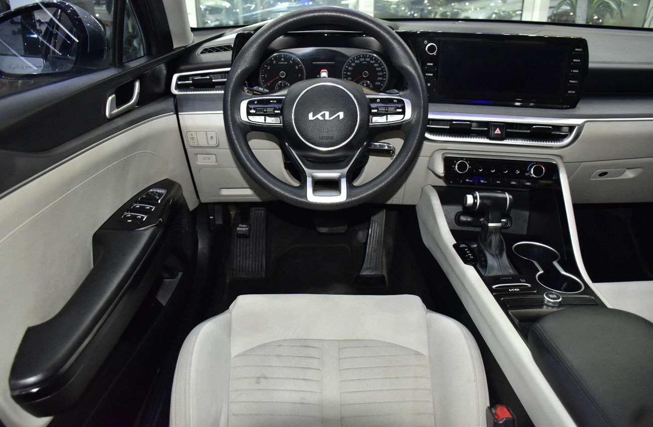 Kia K5 EXCELLENT DEAL for our KIA K5 ( 2023 Model ) in Silver Color GCC Specs