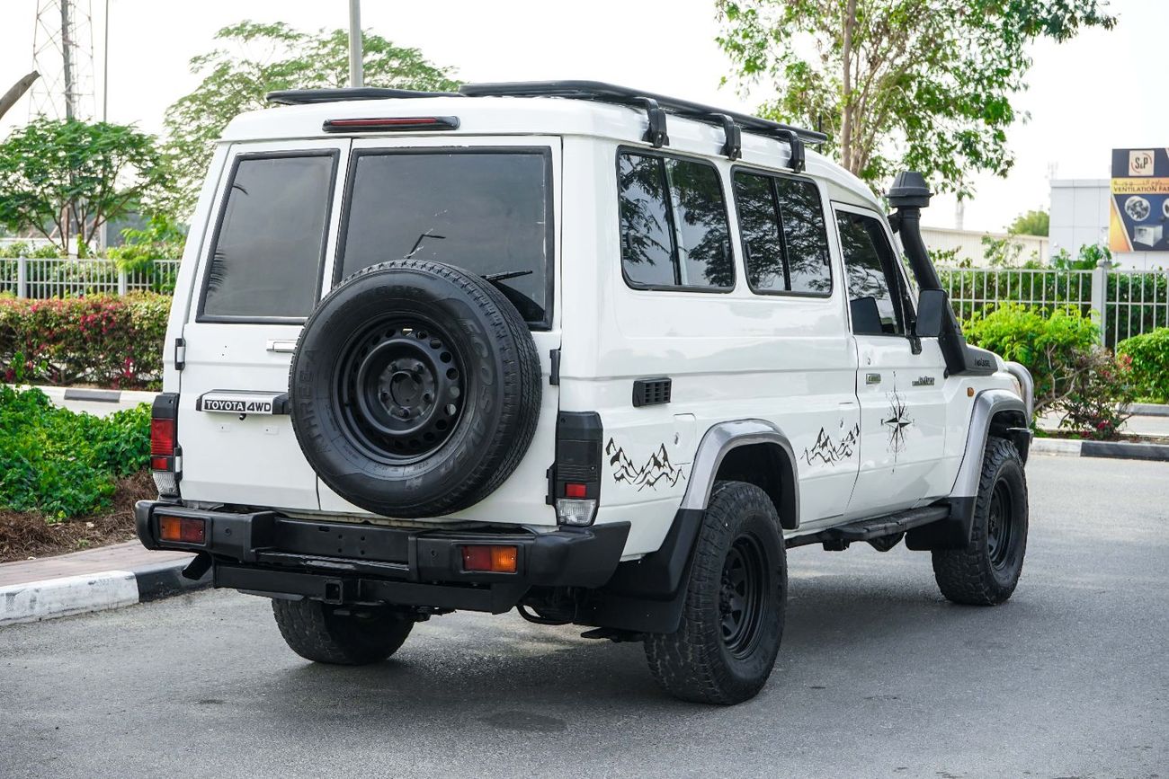 تويوتا لاند كروزر 70 The 2013 Toyota Land Cruiser Hardtop is a rugged, off-road focused SUV from the legendary 70 Series