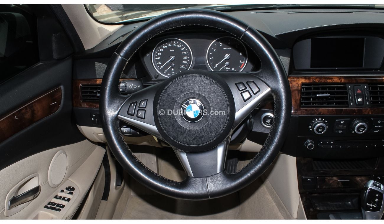 BMW 530i 2009 model Gulf specs Full options  sunroof DVD leather interiors