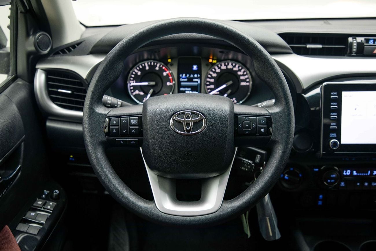 Toyota Hilux 2.4L - Platinum White Inside Maroon | Export Only