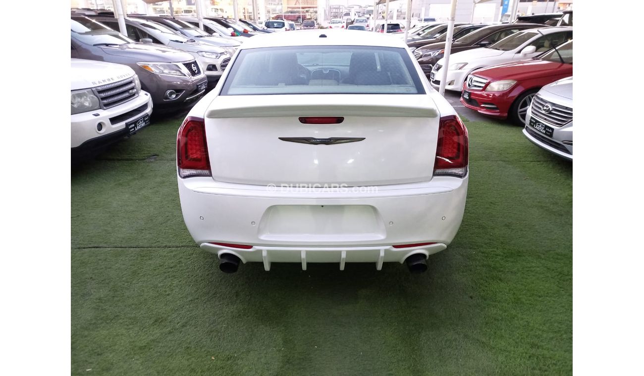 كرايسلر 300 موديل 2014  محول 2021رادار بصمة  وارد مثبت سرعة تحكم رنجات حساسات جناح خلفى بحالة ممتازة