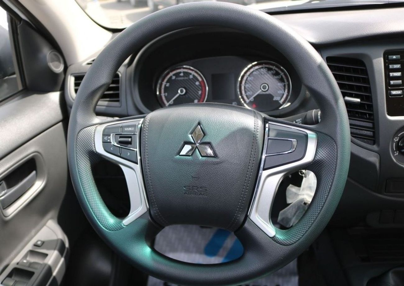 Mitsubishi L200 2023 | SPECIAL LIMITED TIME OFFER 2023 PETROL 2.4 L - 4X4 - M/T WITH POWER WINDOWS MIRRORS AND FABRI