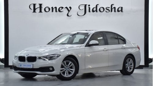 BMW 318 EXCELLENT DEAL for our BMW 318i ( 2018 Model ) in White Color GCC Specs