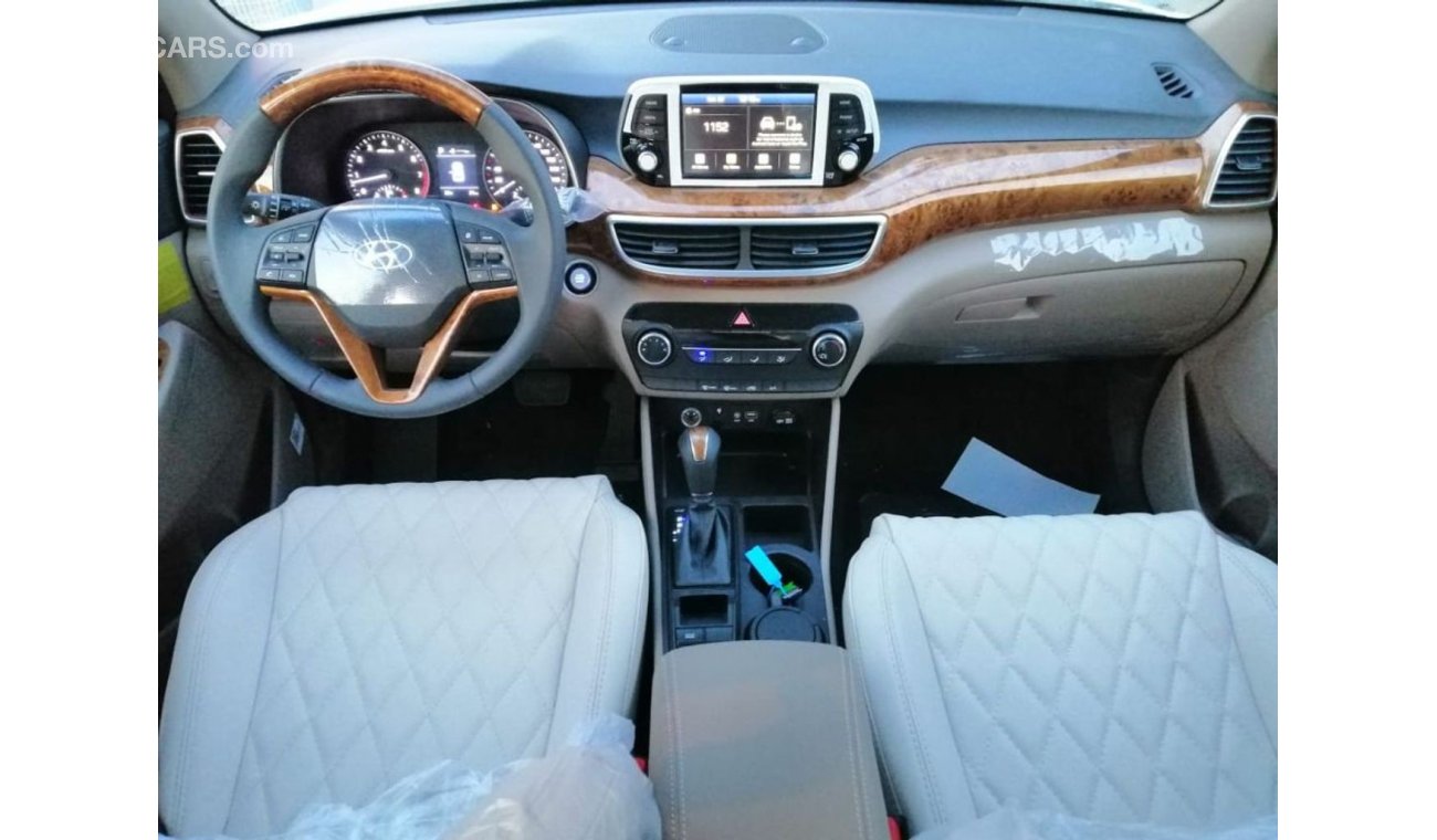 Hyundai Tucson 2.0  with leather seat ,electric seat